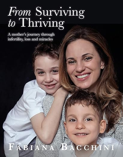 A woman smiles and hugs two boys, all facing the camera. Text on the image reads, "From Surviving to Thriving: A Mother's Journey Through Infertility, Loss and Miracles" by Fabiana Bacchini.